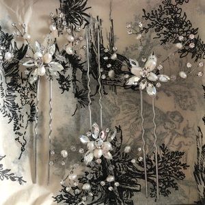 NEW!!!   Never used. Beautiful silver/crystal Pricilla Pinwheels 3pc